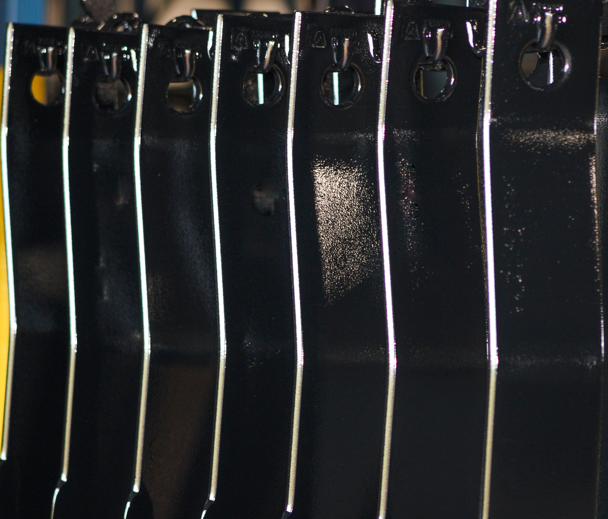 Powder coated parts in a row